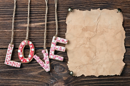 Valentine's Day cookies and old paper for congratulationの写真素材