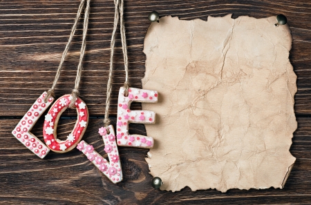 Valentine's Day cookies and old paper for congratulationの写真素材