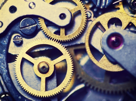 clock mechanism made in the technique of toning. Very shallow depth of field. Focus on the left gearsの写真素材