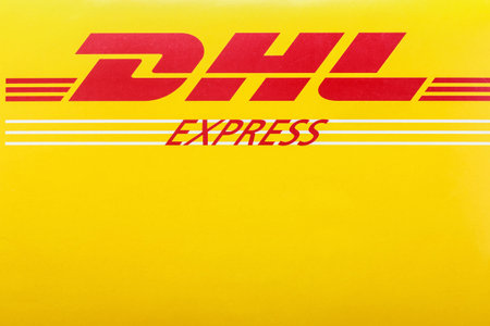 Moscow, Russia - April 24, 2014: Envelope logo DHL. DHL German multinational company, one of the world leaders in the logistics market, the company was founded in 1969.のeditorial素材