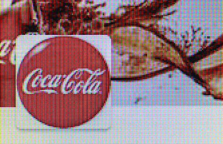 Moscow, Russia - September 24, 2014: Close-up open company logo of Coca-Cola on a home computer screen. "Coca-Cola" Non-alcoholic carbonated drink produced by The Coca-Cola Companyのeditorial素材