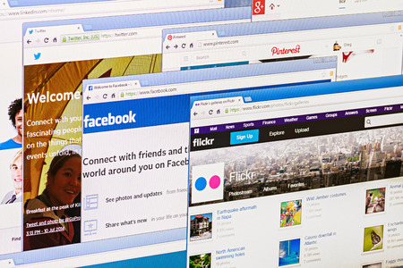 Moscow, Russia - August 26, 2014: Photo of Pinterest, Twitter, Facebook, Google+, Linkedin, Flickr and Instagram homepage on a monitor screen. This is the most popular social network in the world.のeditorial素材