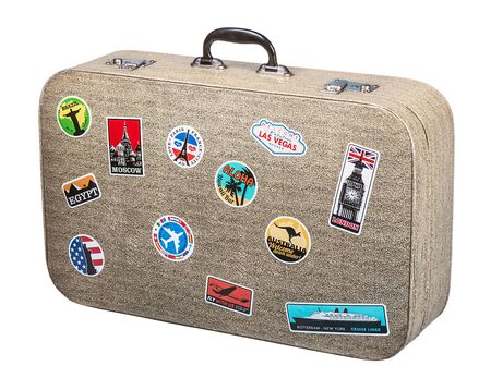 old suitcase traveler isolated on a white backgroundの写真素材