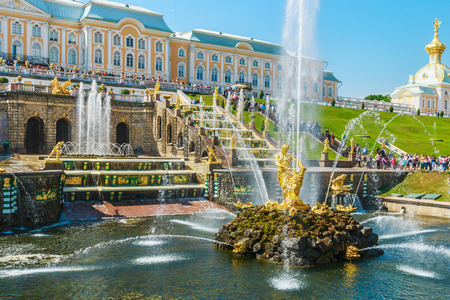 ST PETERSBURG, RUSSIA - JUNE 21, 2015: Tourists in Peterhof fountains of the Grand Cascade. The Peterhof Palace included in the UNESCO's World Heritage List. focus on Samsonのeditorial素材