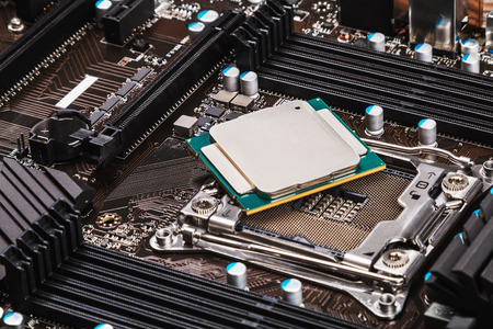 CPU socket and processor on the motherboard. focus on top of CPU