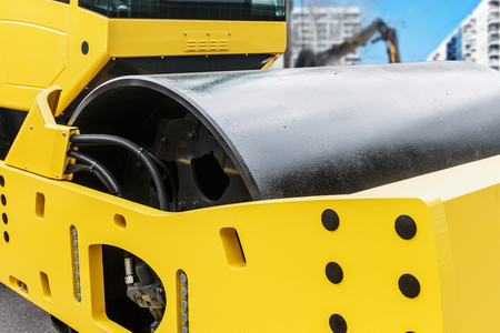 Construction compactor in the operation site closeup