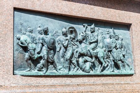Moscow, Russia - August 7, 2016: Back of the relief on the monument to Minin and Pozharsky in Moscow, St. Basil Cathedral.のeditorial素材