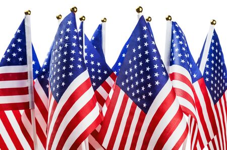small American flags isolated on white backgroundの写真素材