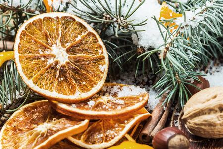 dried oranges with nuts for the Christmas holiday. Focus on the orange slicesの写真素材