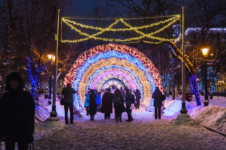 MOSCOW, RUSSIA - January 14, 2017: People and tourists walk along Moscow decorated for New Year and Christmas holidays. Christmas village fair on Tverskaya street in the Moscowのeditorial素材