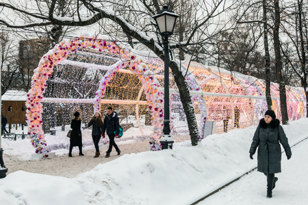 MOSCOW, RUSSIA - January 14, 2017: People and tourists walk along Moscow decorated for New Year and Christmas holidays. Christmas village fair on Tverskaya street in the Moscowのeditorial素材