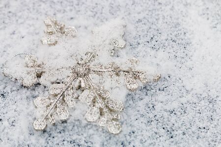 beautiful snowflake in the snow. Christmas decorationsの写真素材