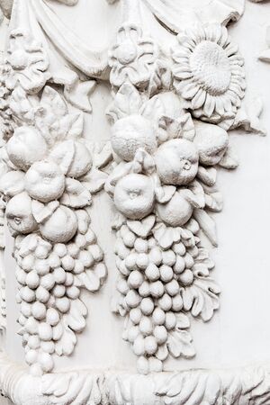 Bas-reliefs and sculptural details in the design of stone artの写真素材