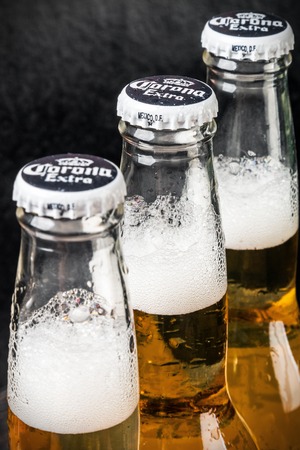 Moscow, RUSSIA - April 6, 2017: Corona extra beer global brand. Corona extra Lager Beer is the flagship product of the Mexican company Grupo Modeloのeditorial素材