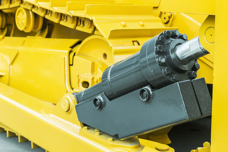 hydraulics tractor yellow. focus on the hydraulic pipesの写真素材