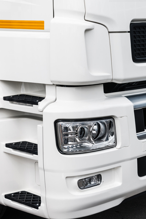 lights and part of the cabin of the white truckの写真素材