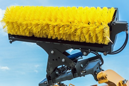 brush for street cleaning ha harvesting technique on the sky backgroundの写真素材