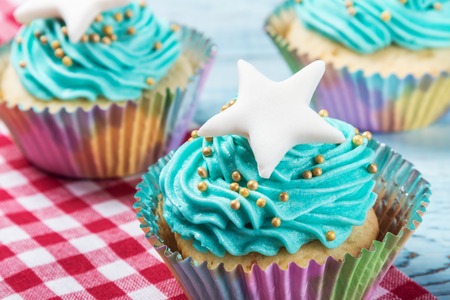 cakes cupcakes to the celebration of Christmas on the tableの写真素材