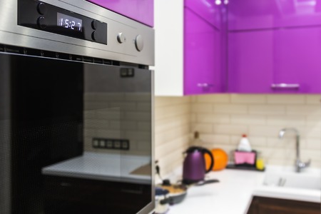 kitchen appliances built into kitchen cabinets. Production of furniture production. The utensils and items for the kitchen. Fox numbers on the displayの写真素材