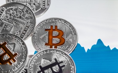 coin cryptocurrency bitcoin on the background growth rate. bitcoin the most Popular cryptocurrency in the worldの写真素材