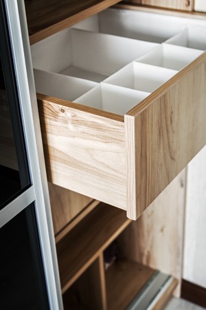 Wardrobe with sliding doors and drawers drawer. modern materials and furniture for interiorの写真素材