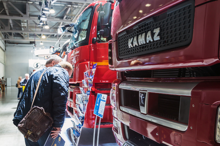 Moscow, Russia-June 5, 2018: KAMAZ trucks in the pavilion at the international specialized exhibition of construction equipment and technologies bauma ctt Russia in Moscowのeditorial素材