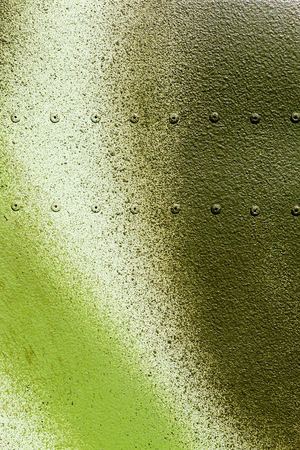 texture of the armor of the car, Transporter, airplane, etc. with rivets of camouflage color. Backgroundの写真素材