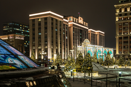 Moscow, Russia-December 25, 2018: beautifully decorated Moscow and red square for New year and Christmas. Manezhnaya square and the building of the State Duma of the Russian Federationのeditorial素材