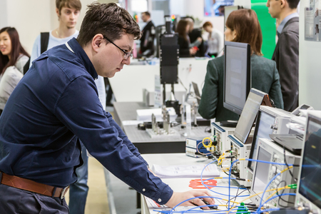 Moscow, Russia-March 4, 2019: PHOTONICS exhibition. WORLD OF LASERS AND OPTICS 2019. Visitors to the...