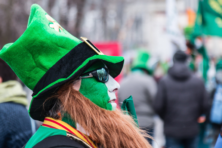 MOSCOW, Russia - MARCH 16, 2019 Saint Patricks Day celebration in Sokolniki park in Moscow. People walking around and having fun at a partyのeditorial素材
