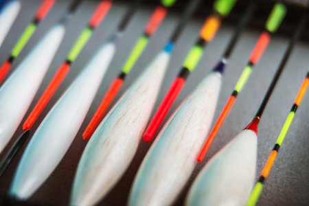 many different fishing floats in the box. fishing tackle and accessories for catching Herabuna