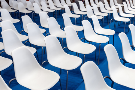 white chairs with metal legs in the conference room or meeting roomの写真素材