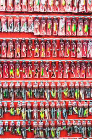 Moscow, Russia-February 28, 2019: exhibition at VDNH Hunting and Fishing in Russia. different in color and size fishing lures and baitsのeditorial素材