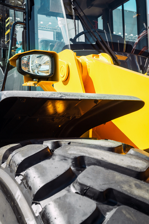 headlights tail and the front part of the tractor or bulldozerの写真素材