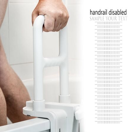 hand holding handrail for the disabled and the elder in the bathroom. Text deleteの写真素材