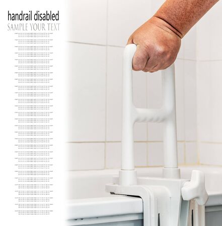 hand holding handrail for the disabled and the elder in the bathroom. Text deleteの写真素材