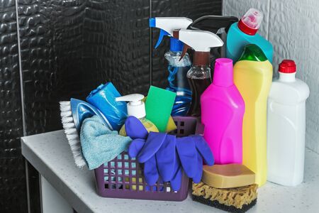 different products and items for cleaning on the floor in the toilet room. Concept cleaningの写真素材