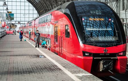 Moscow, Russia - August 8, 2019: cleaning company workers are preparing a high-speed train for a trip to the kievsky station in Moscow.のeditorial素材