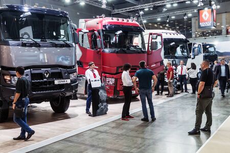 Moscow,RUSSIA - SEPTEMBER 5, 2019: 15TH INTERNATIONAL EXHIBITION OF COMMERCIAL VEHICLES "COMTRANS 2019". visitors to the stand Renault cars at the exhibitionのeditorial素材