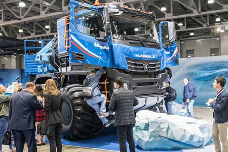 Moscow,RUSSIA - SEPTEMBER 5, 2019: 15TH INTERNATIONAL EXHIBITION OF COMMERCIAL VEHICLES "COMTRANS 2019". visitors to the stand KAMAZ cars at the exhibitionのeditorial素材