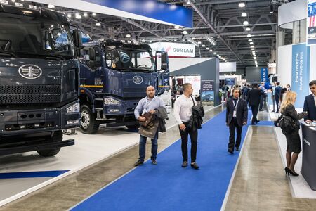 Moscow,RUSSIA - SEPTEMBER 5, 2019: 15TH INTERNATIONAL EXHIBITION OF COMMERCIAL VEHICLES "COMTRANS 2019". visitors at the stand of FAW cars at the exhibitionのeditorial素材