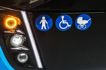 signs on front of bus or electric bus wheelchairs, prams, elderly peopleの写真素材