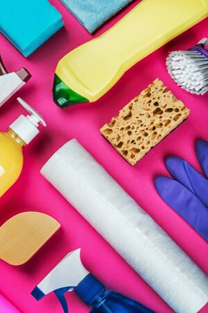 assortment of different cleaning products for the house on a colored background.の写真素材