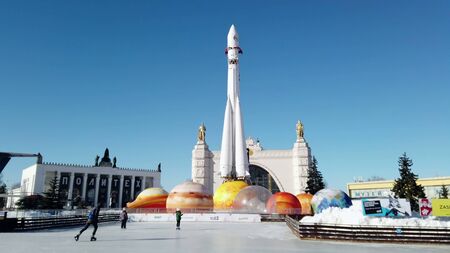 Moscow, Russia-February 19, 2019: children and adults skate at the skating rink at the Cosmos pavilion at VDNH in Moscow.のeditorial素材