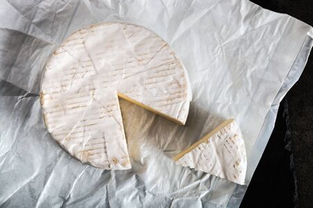 brie cheese on a plate on the table. soft cow's milk cheeseの写真素材