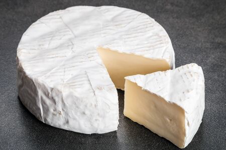 brie cheese on a plate on the table. soft cow's milk cheeseの写真素材