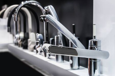 water faucets are on display in the store. The contrast of black and whiteの写真素材