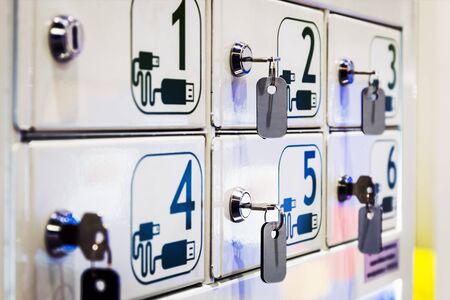 metal boxes cells with charging for smartphone or gadgetの写真素材