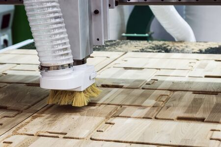 woodworking machine with a cutter and brush on the sawmillの写真素材
