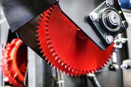 sawmill feeding discs in woodworking machine in woodworking factory or sawmill.の写真素材
